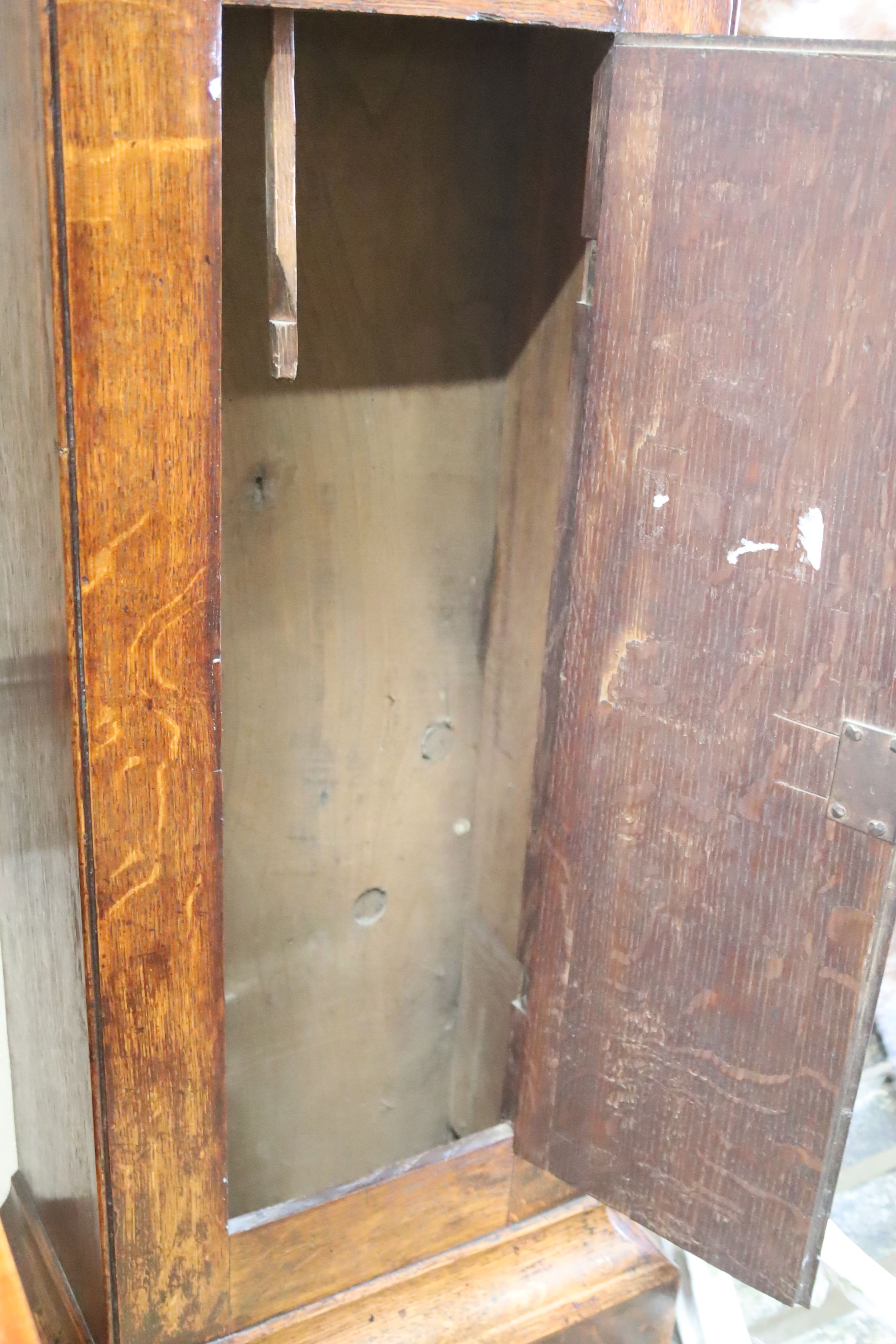 An early 19th century oak eight day longcase clock, marked Cousens Langport, height 194cm